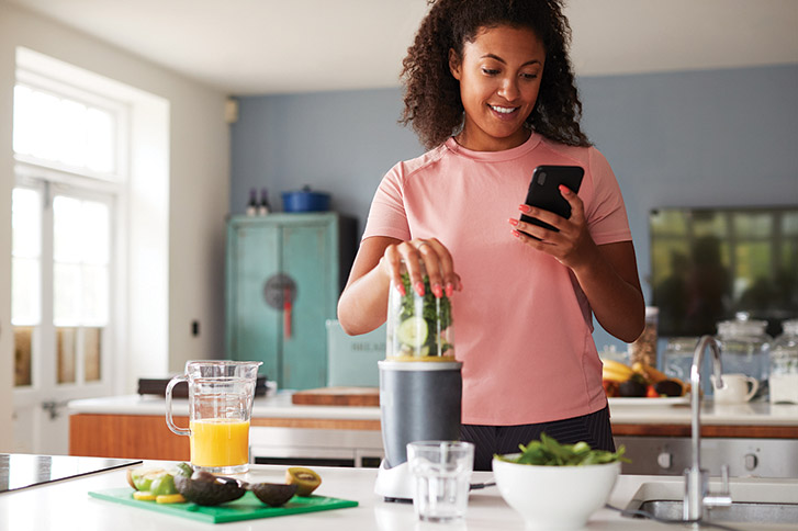 Woman Using Fitness Tracker